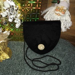 Velveteen clutch with beaded clasp